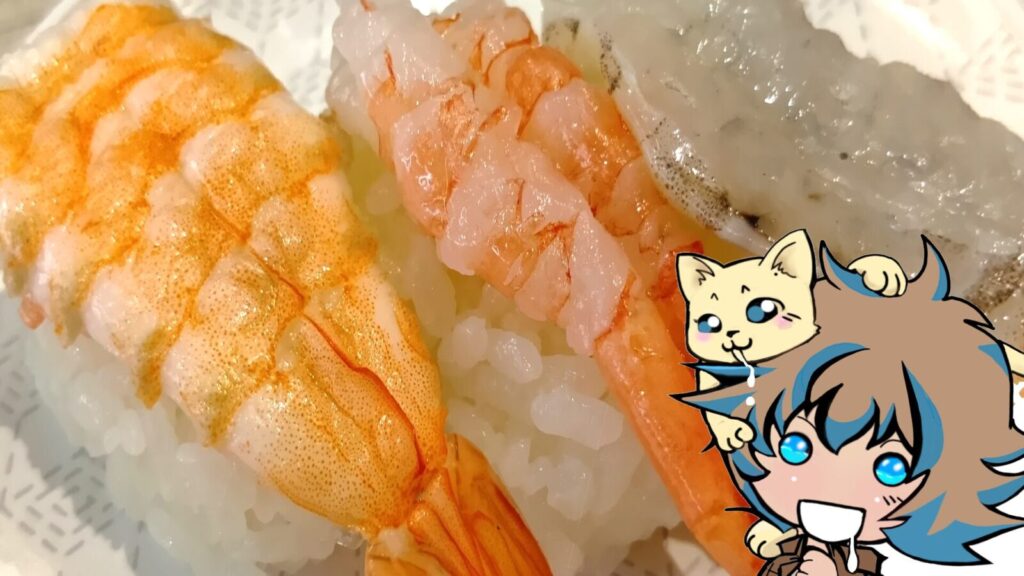 えび3貫盛りを見ながら、よだれを垂らす筆者はると飼い猫シロ。シロのよだれがはるの髪にもたれている画像